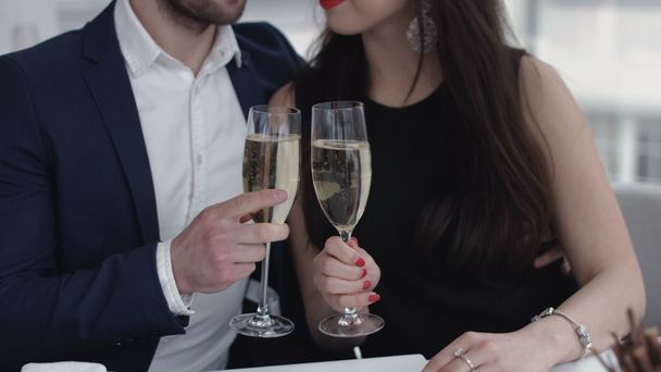 Couple toasting with champagne in the restaurant - Photo, Image