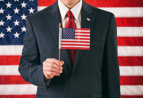 Politician: Man Holding Small USA Flag On Stick - Fotografie, Obrázek