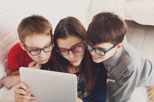 Kids in glasses with tablet, computer addiction - Photo, Image