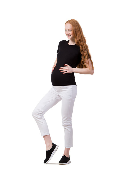 giovane donna incinta isolata su bianco - Foto, immagini