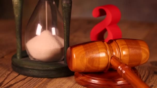 Hourglass, wooden gavel with paragraph sign  - Footage, Video