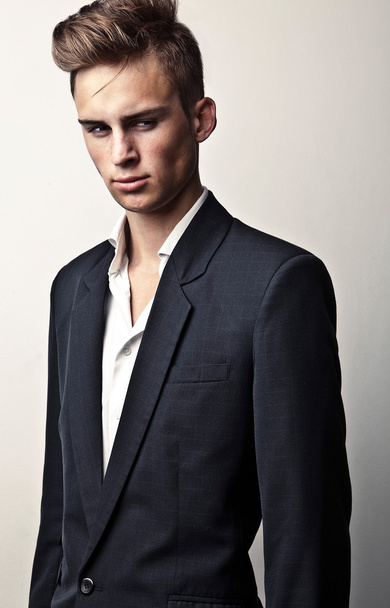 Elegant young handsome man. Studio fashion portrait. - Fotó, kép