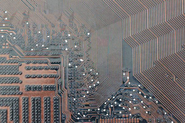 brown electronics background of computer mainboard. - Photo, Image