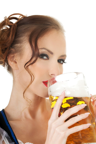 Bavarian woman drinking beer. - Fotó, kép
