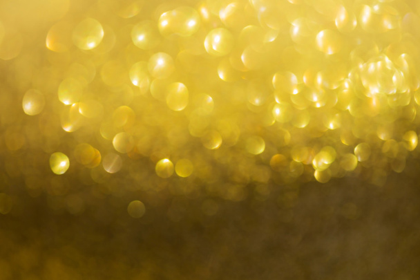 gouden achtergrond, abstract gouden bokeh lichte viering - Foto, afbeelding