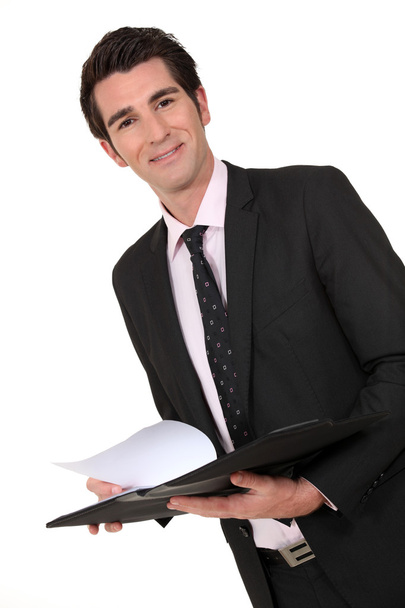 Business man holding a clipboard - Fotoğraf, Görsel