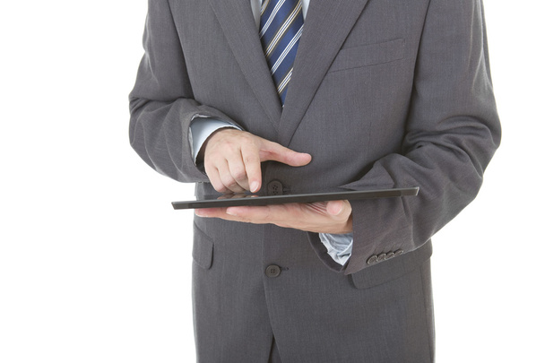 businessman using touch pad, close up shot on tablet pc, isolated - Photo, image