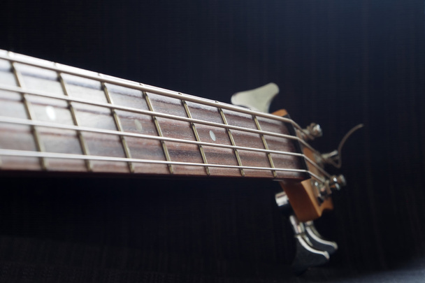 The neck of a bass guitar - Photo, Image