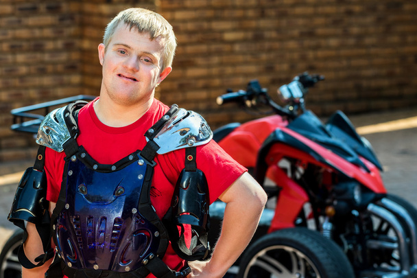 Down syndrome quad bike rider. - Photo, Image