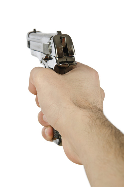 Пістолет в руці на білому
 - Фото, зображення