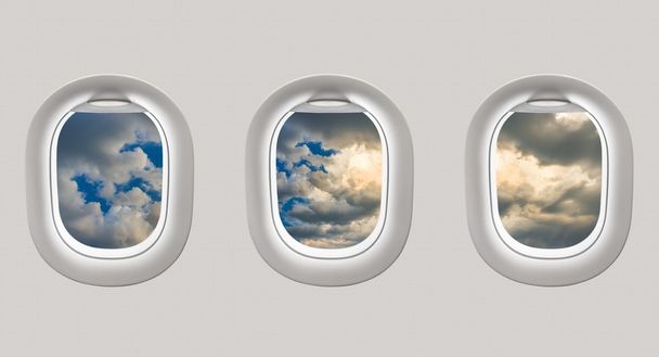 Вид из окон самолета на голубое небо и облака
 - Фото, изображение
