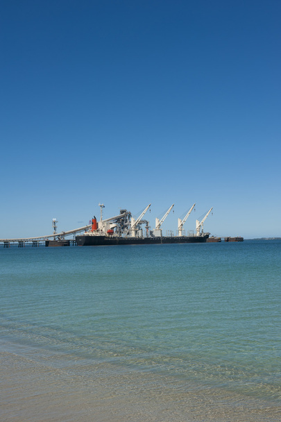 Freight vessel anchoring at jetty - Photo, Image