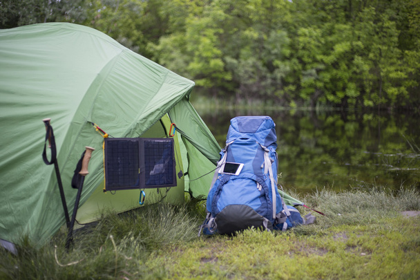 Camping on the banks of the river. - Фото, зображення