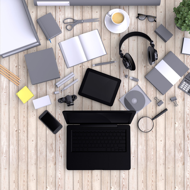 Laptop com variedade de objetos de escritório em branco
. - Foto, Imagem