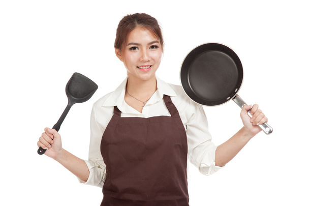Asian girl cook with frying pan - Фото, изображение