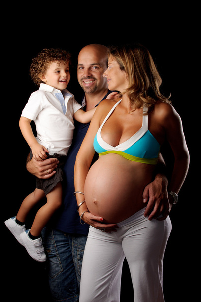 Boldog család terhes nő stúdió - Fotó, kép