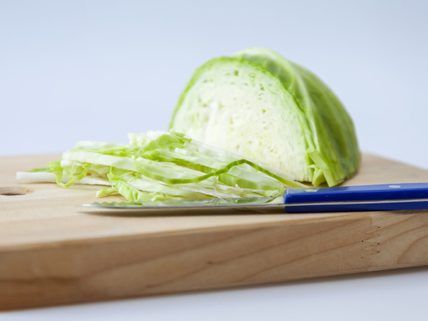 Fresh white cabbage in kitchen - 写真・画像