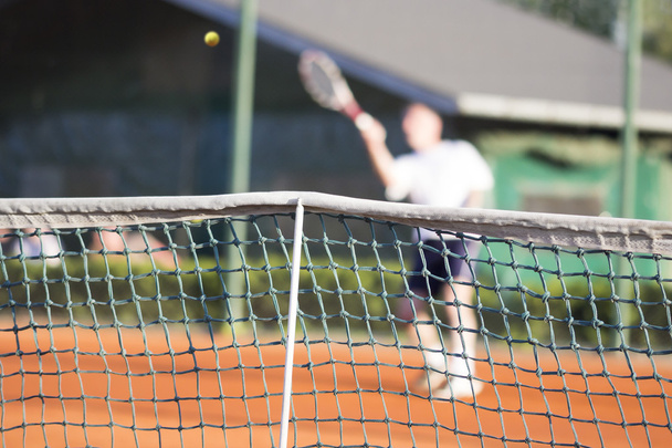 Tenisová síť člověk hraje tenis - Fotografie, Obrázek