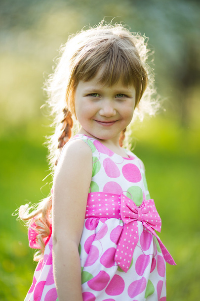 Happy girl in colored summer dress - Photo, image