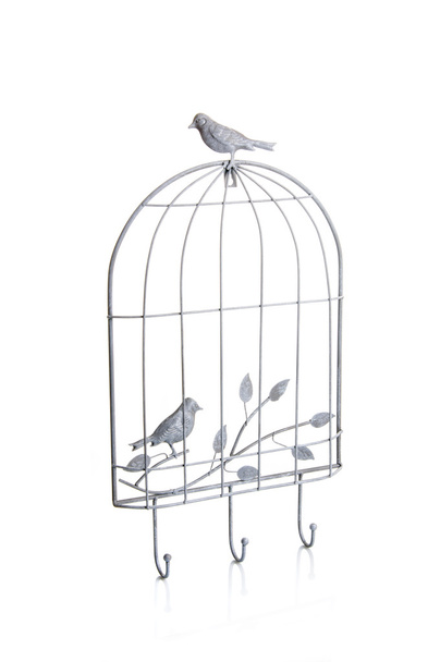 colgadores o ganchos en forma de jaula para pájaros
 - Foto, imagen