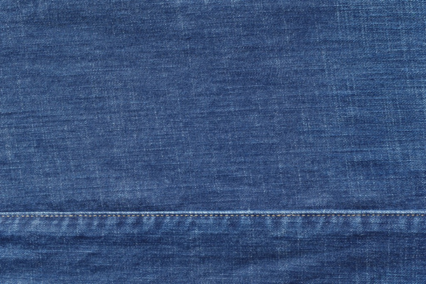 textúra denim, kék színű varrott varrás - Fotó, kép