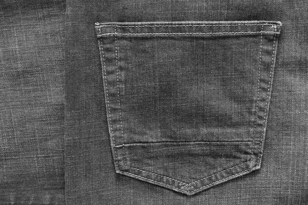 deel jeans kleding met een zak van zwarte kleur - Foto, afbeelding