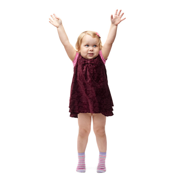 Young little girl standing over isolated white background - Photo, Image