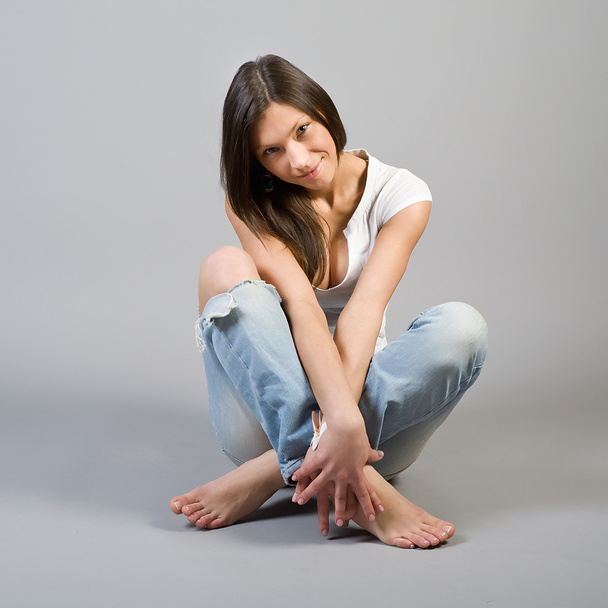Girl in torn jeans - Photo, Image