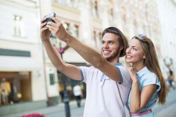 Attractive couple making selfie - Фото, изображение