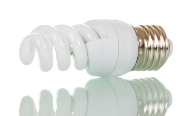Energy saving fluorescent light bulb isolated on white. - Zdjęcie, obraz