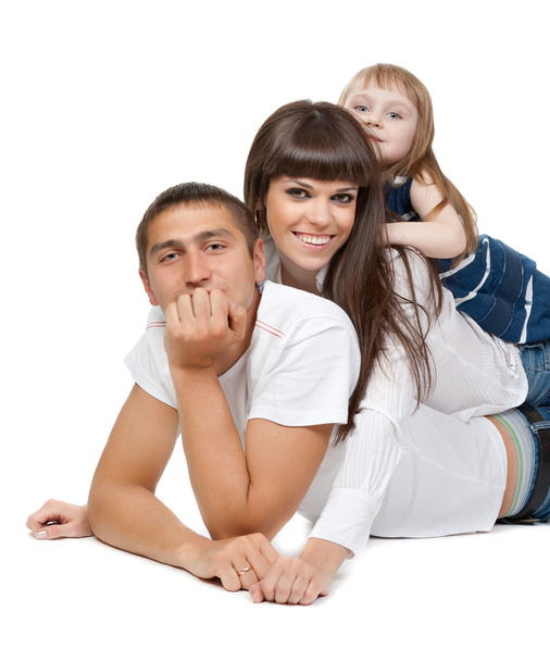 Happy family looking at the camera on their floor - Фото, изображение