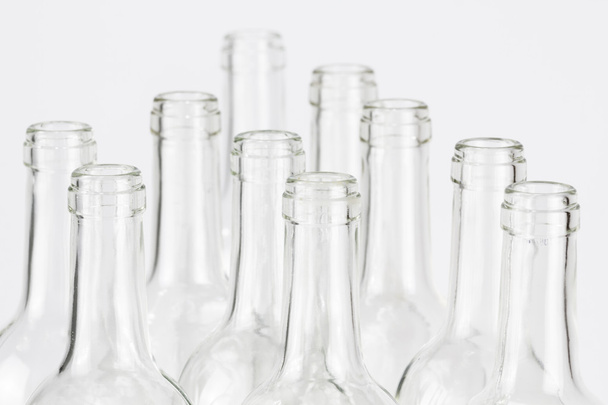Група порожніх скляних пляшок
 - Фото, зображення