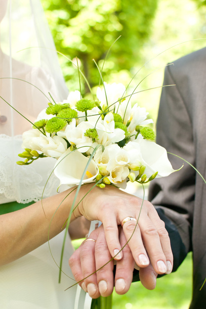 Hands and flower bouquet - Photo, Image
