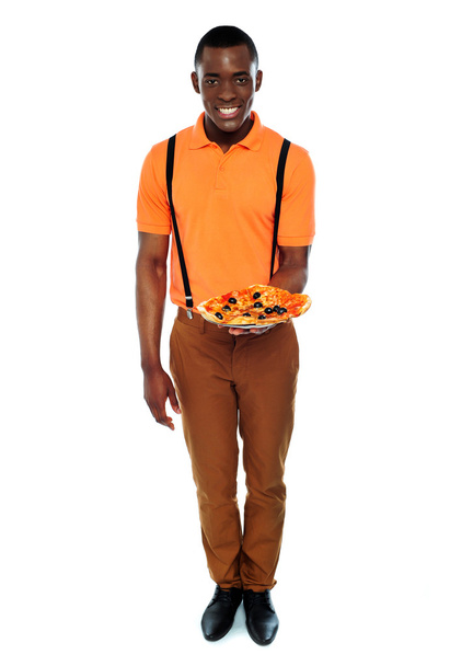 Full length portrait of delivery boy with pizza - Foto, afbeelding