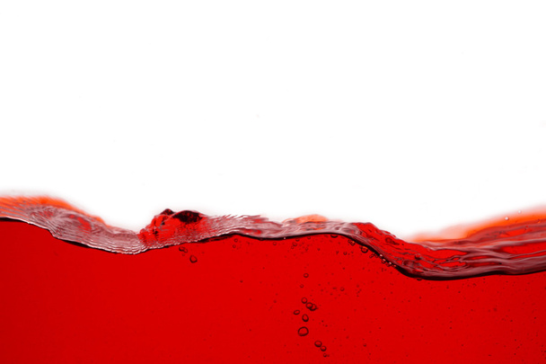 Red wine splash - close up abstract background - Foto, afbeelding