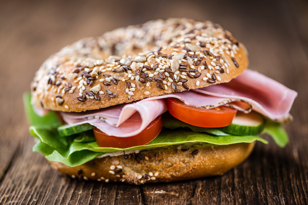 Bagel with Ham on table - Photo, image