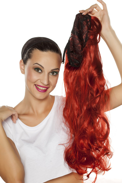 woman with a red wig - Фото, зображення