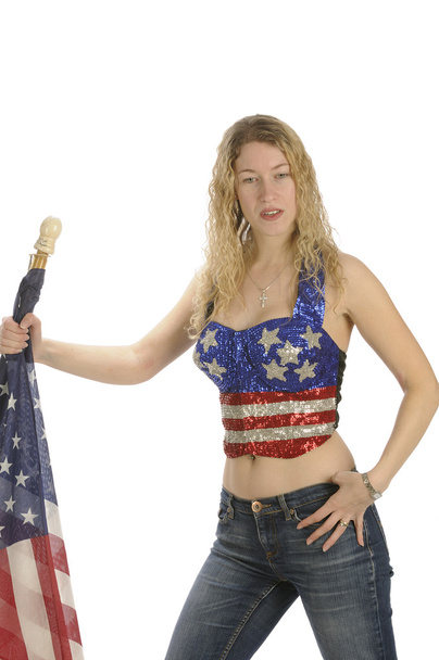 Attractive female American Patriot with flag - Fotoğraf, Görsel