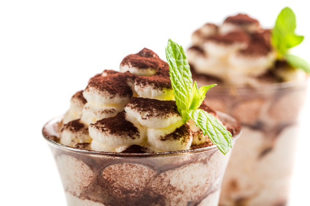 Closeup of tiramisu dessert on a white background - Foto, immagini