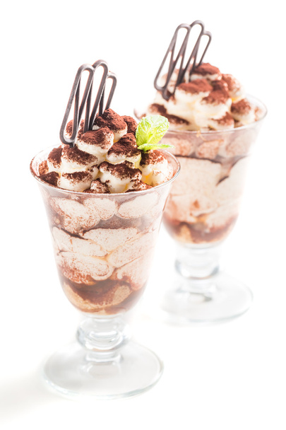 Ice cream tiramisu with cocoa on a white background - Фото, зображення