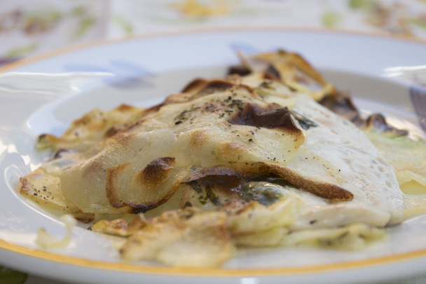 Filetes de solla con costra de patata
 - Foto, Imagen