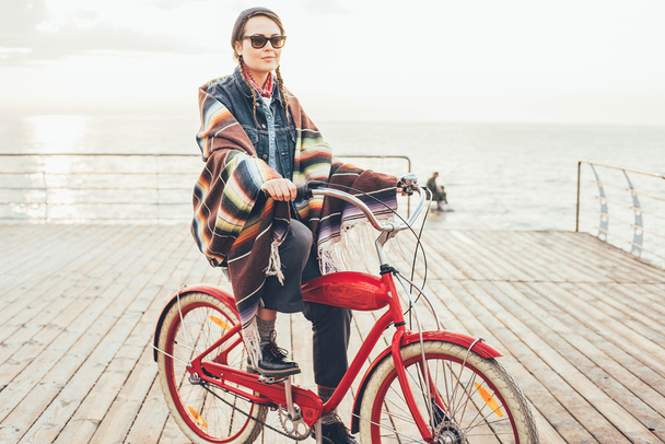 woman with vintage bicycle - Fotó, kép