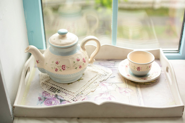  teapot and cup on a tray  - Zdjęcie, obraz
