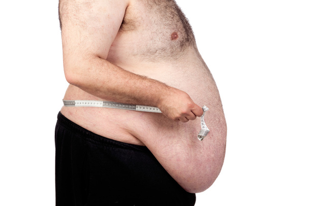 Fat man with a tape measure - Photo, Image