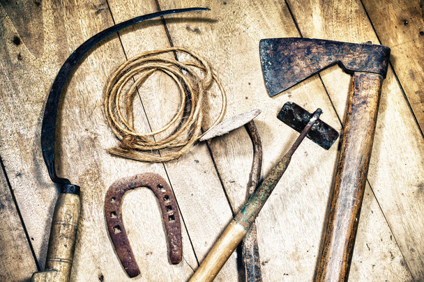 Different rustic tools on wooden floor - Foto, Imagen