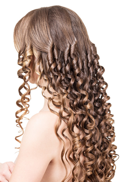 Woman with shiny brown curls isolated on  white background. - Valokuva, kuva