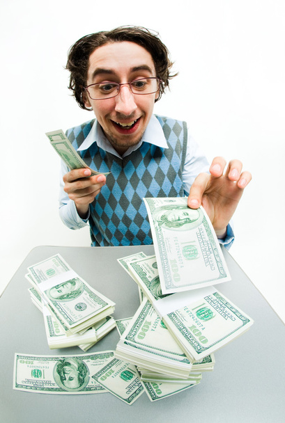 Contando dinero
 - Foto, Imagen