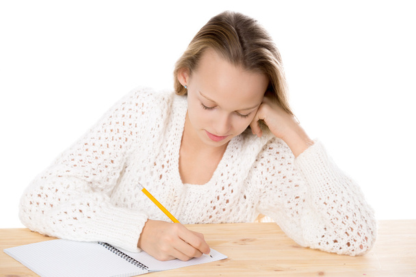 Mädchen schreibt im Copybook - Foto, Bild