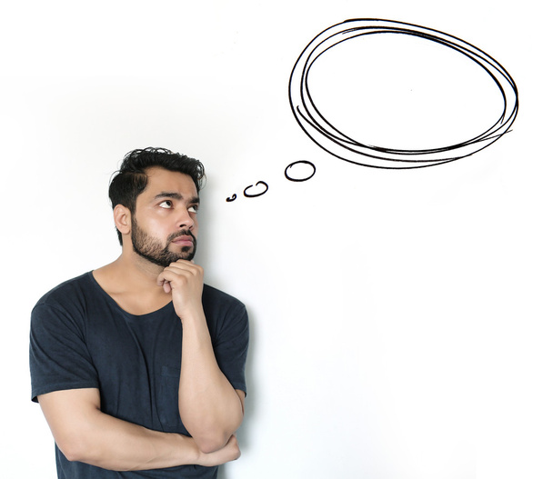 Young Indian Man thinking of thought bubble on white Background - Photo, Image