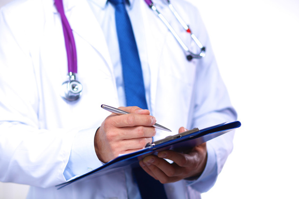 opieki zdrowotnej i medycyny pojęcie - poważne lekarz z stetoskop - Zdjęcie, obraz